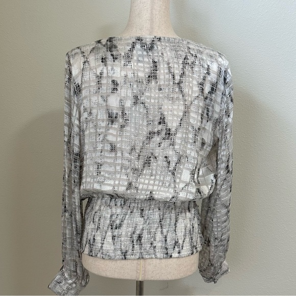 Stunning White House Black Market Silk Surplice Blouse with Fitted Bottom. - Picture 3 of 5